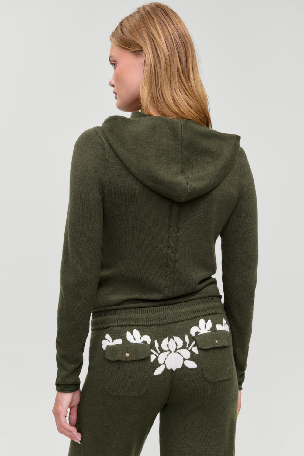 Calvin knit lounge pant in Alpine Flower worn with the matching Calvin knit zip up hoodie, back view