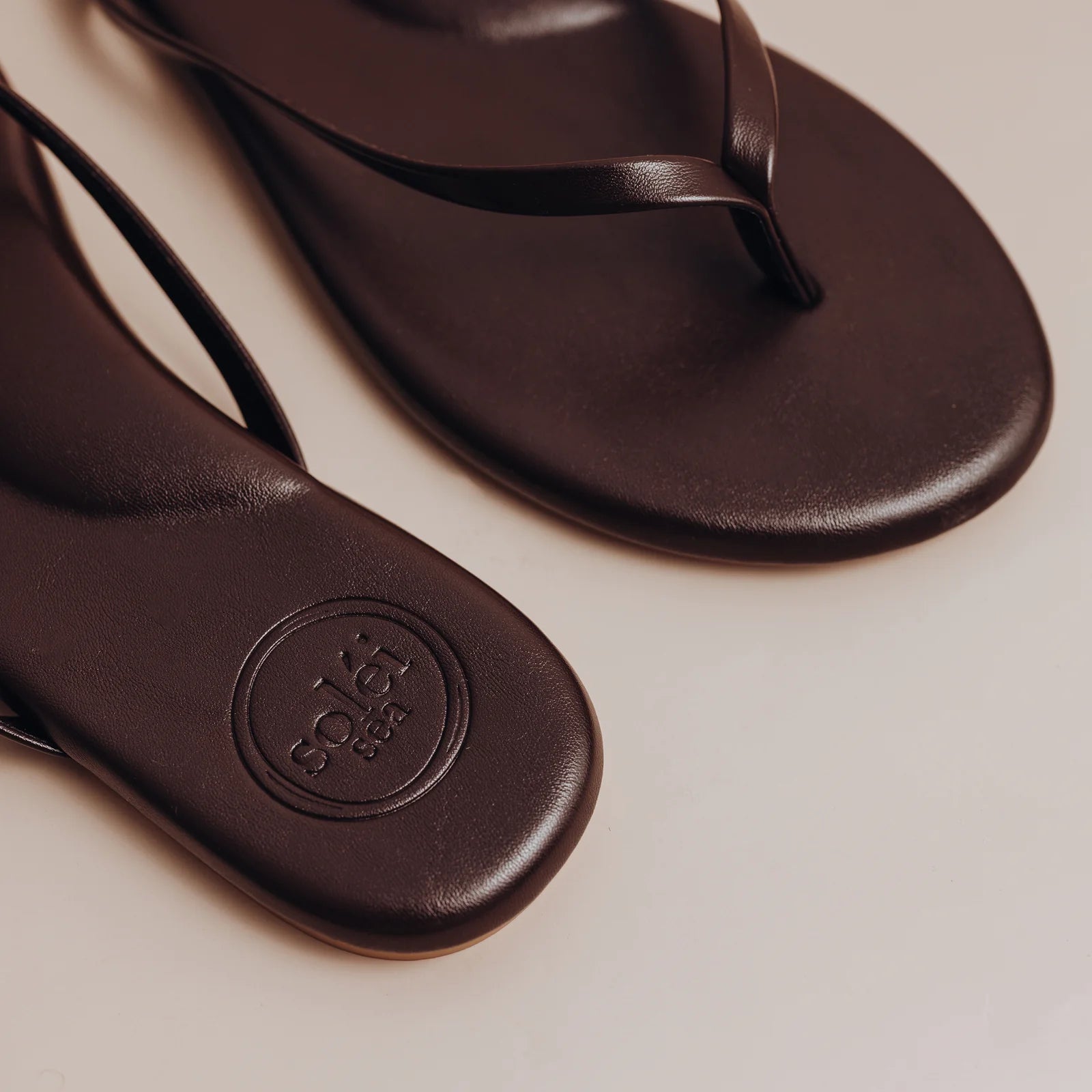 Indie Flat Strap Sandal Chocolate in brown — close-up | Belle Mar Swim