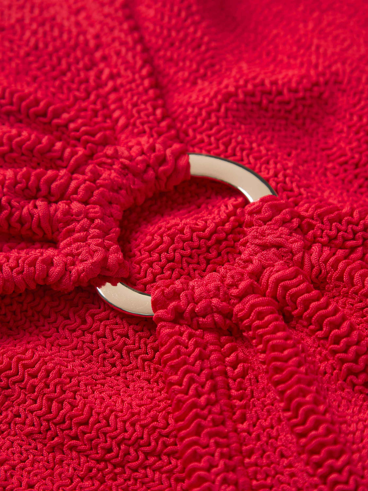 Hunza G Red Original Crinkle fabric detail with gold hoop hardware | Belle Mar Swim