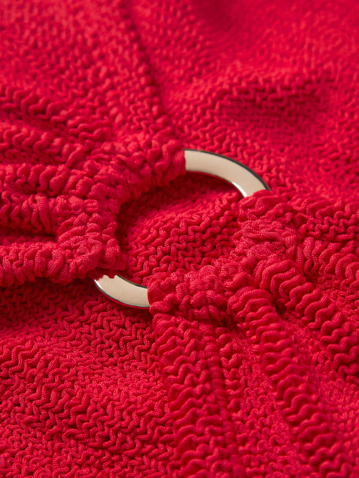 Hunza G Red Original Crinkle fabric detail with gold hoop hardware | Belle Mar Swim