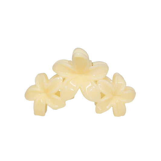 Miss Super Bloom Clip in Jelly Lemon, a hair claw clip with three butter yellow plumeria flowers
