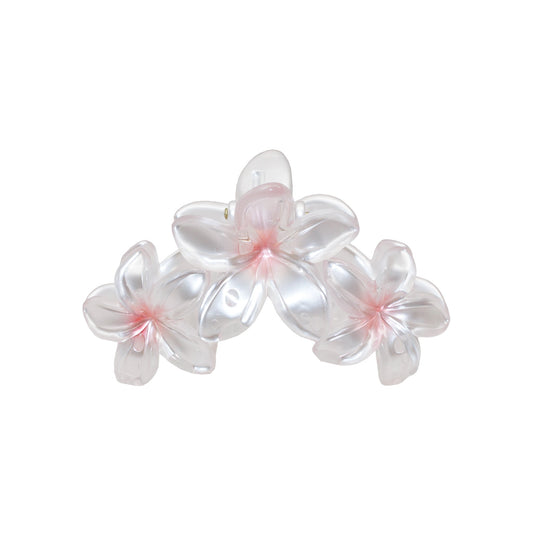 Miss Super Bloom Clip in Rose Pearl, a hair claw clip with three pale pink plumeria flowers